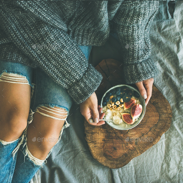 Healthy vegetarian winter breakfast in bed concept, top view - Stock Photo - Images