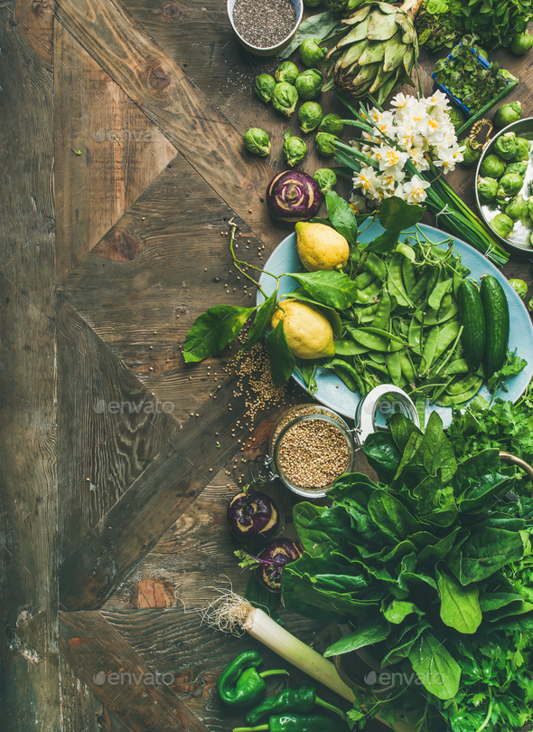 Spring healthy vegan food cooking ingredients, wooden background, copy space - Stock Photo - Images