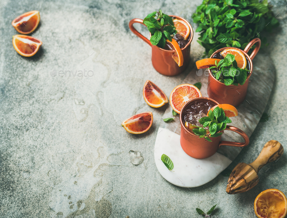 Blood orange Moscow mule alcohol cocktails, copy space - Stock Photo - Images