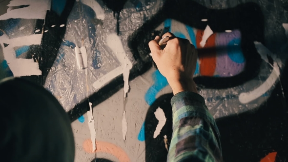 The Painter Paints the Wall in Black Color. alt