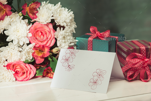 Love background with pink roses, flowers, gift on table - Stock Photo - Images