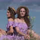 Two Twin Girls Sit Together on Summer Field in Identical Dresses and Straw Hats - VideoHive Item for Sale