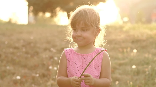 Silhouette of a Little Girl in the Park at Sunset, Stock Footage ...