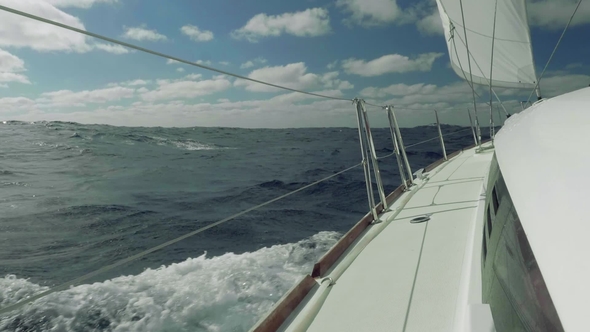 View of Ocean, Waves, Splashes From Board of Sailing Yacht