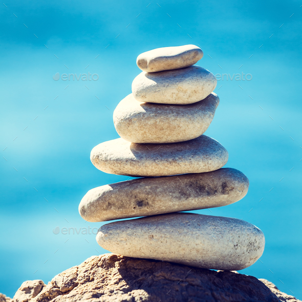 Stones balance, vintage pebbles stack background - Stock Photo - Images