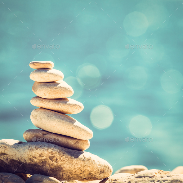 Stones balance, vintage pebbles stack background - Stock Photo - Images