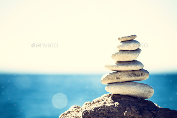 Stones balance, vintage pebbles stack background - Stock Photo - Images