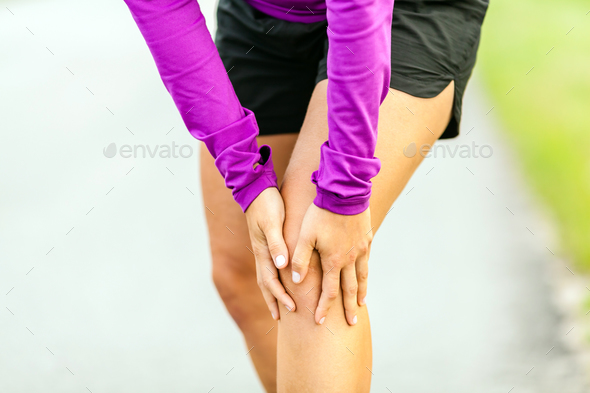 Physical injury, running knee pain - Stock Photo - Images