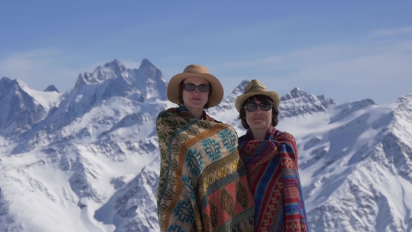 Women Rolled in Blankets in the Mountains