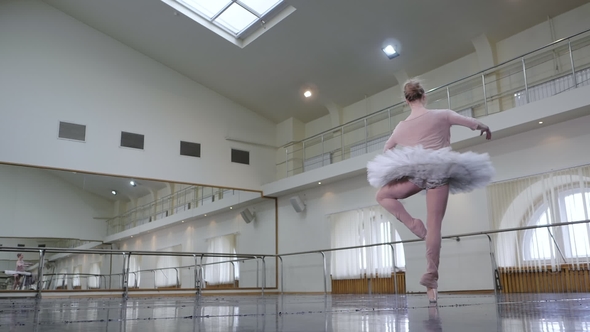 Ballerina in White Ballet Tutu Dress Performing Pirouettes in Dance Studio or Gym. Graceful Woman alt