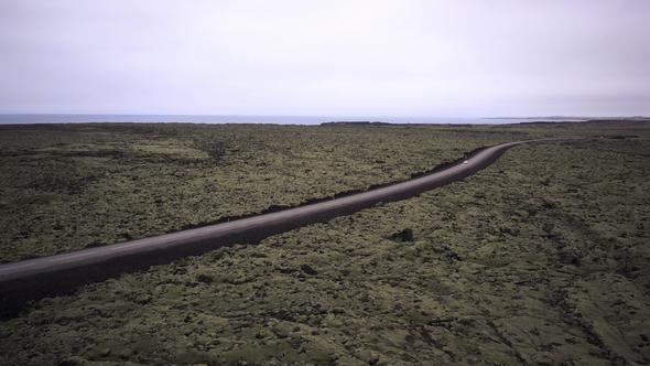 Iceland Country Roadway with Moving Cars