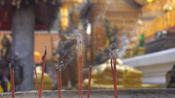 Smoking Incense Sticks for Praying Buddha Gods To Show Respect. a Lot of Smoke Is Flowing
