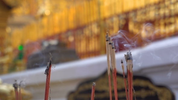 Smoking Incense Sticks for Praying Buddha Gods To Show Respect. a Lot of Smoke Is Flowing