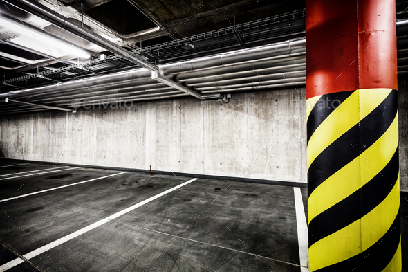 Concrete wall underground parking garage interior