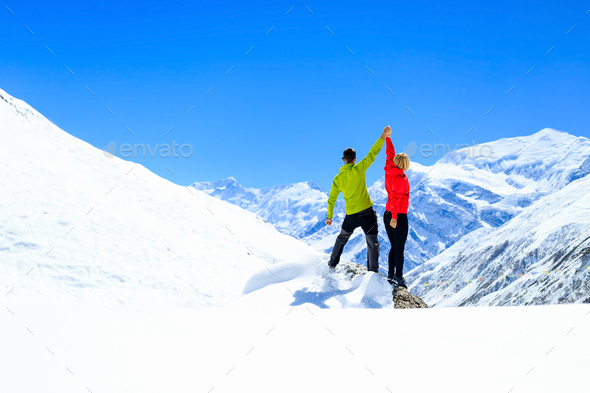 Teamwork motivation, success in winter mountains - Stock Photo - Images