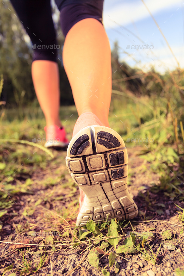 Walking or running legs in forest, adventure and exercising - Stock Photo - Images