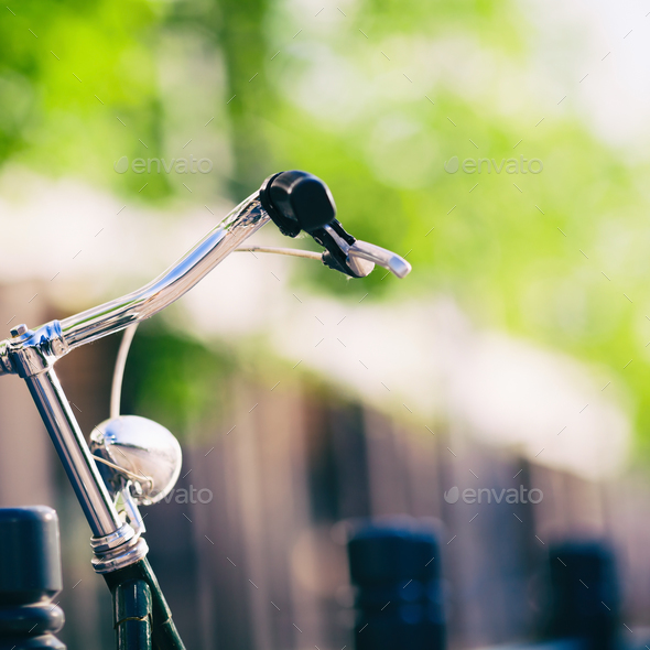 Vintage city bike colorful retro light and handlebar - Stock Photo - Images