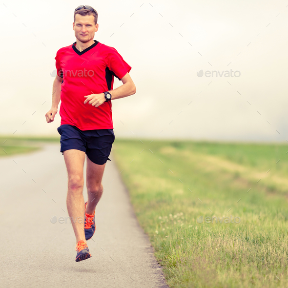 Man running and training healthy lifestyle - Stock Photo - Images