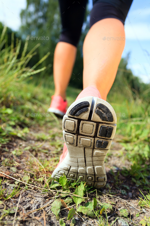 Walking or running legs in forest, adventure and exercising - Stock Photo - Images