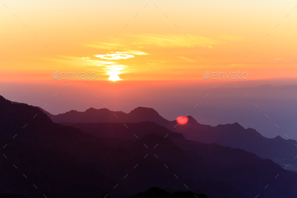 Mountains inspirational sunset landscape, islands and ocean - Stock Photo - Images