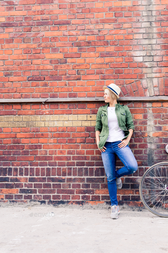 Hipster woman with vintage road bike in city - Stock Photo - Images