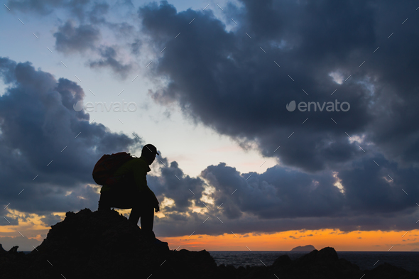 Man silhouette backpacker, inspirational ocean landscape - Stock Photo - Images