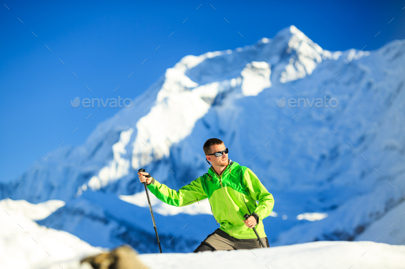 Man hiking in Himalaya Mountains in Nepal - Stock Photo - Images