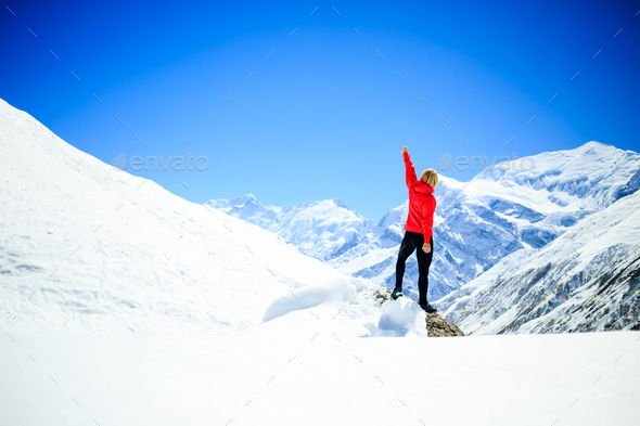 Woman success climbing on mountain peak - Stock Photo - Images