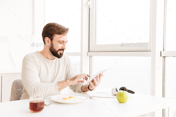 Portrait of healthy adult man in casual shirt smiling and having - Stock Photo - Images