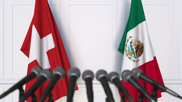 Flags of Switzerland and Mexico at International Press Conference ...