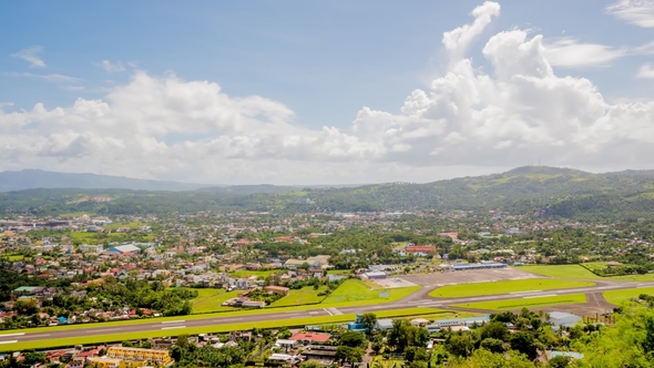 Panorama of the City of Legazpi on the Background of the Airport. Luzon, Philippines