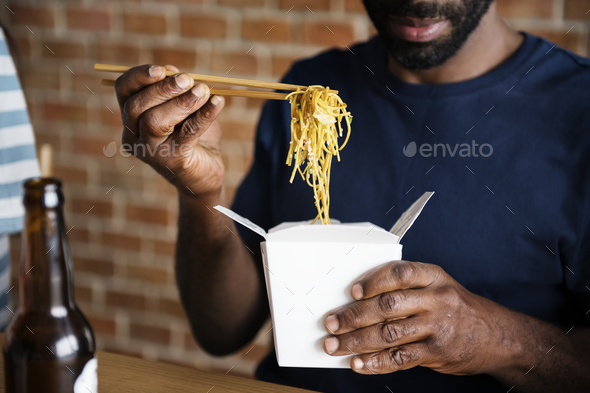 Black man eating Chow mein Stock Photo by Rawpixel | PhotoDune