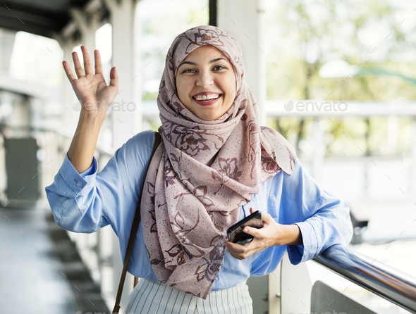 Islamic woman say hi to friend