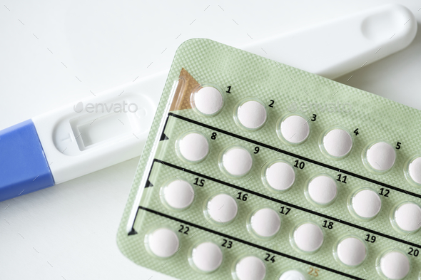 Closeup of pregnancy test and contraceptive pills birth control concept Stock Photo by Rawpixel