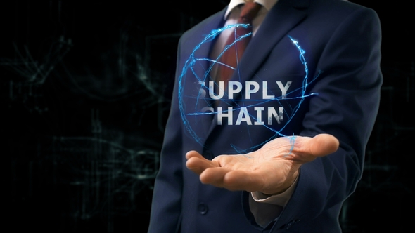 Businessman Shows Concept Hologram Supply Chain on His Hand