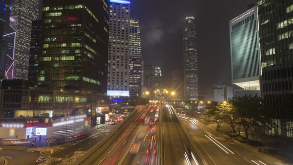 Cars Traffic and Hong Kong Skyscrapers at Night alt