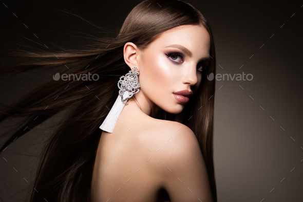 Hair. Beauty Woman with Very Long Healthy and Shiny Smooth Brown Hair. Model Brunette Gorgeous Hair - Stock Photo - Images