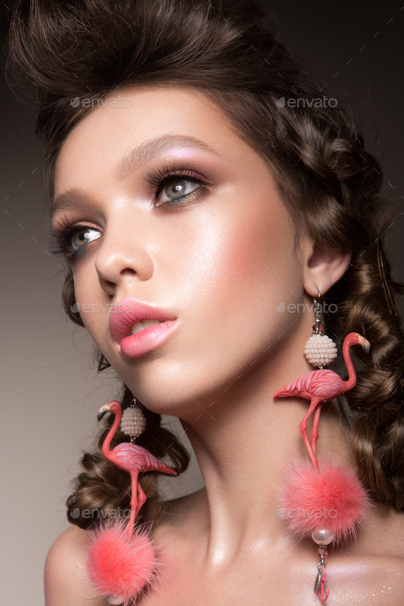 Glamour portrait of beautiful girl model with makeup and romantic hairstyle. - Stock Photo - Images