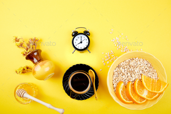 Morning coffee, granola breakfast, alarm clock - Stock Photo - Images