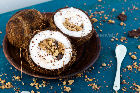 Healthy breakfast in coconut bowl. - Stock Photo - Images