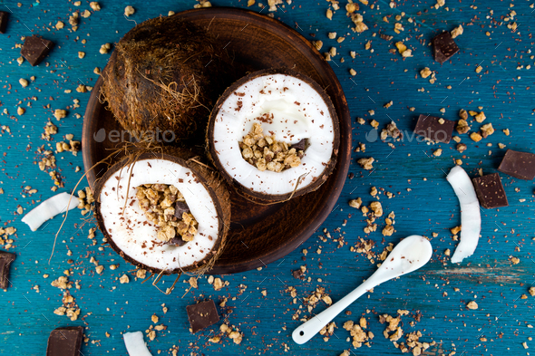 Healthy breakfast in coconut bowl. - Stock Photo - Images