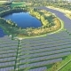 Aerial Shot of Solar Power Plant with Beautiful Lake in the Middle - VideoHive Item for Sale