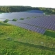 Aerial Shot of Solar Power Plant with Beautiful Lake  - VideoHive Item for Sale