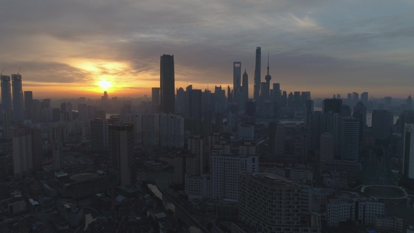 Shanghai Skyline at Sunny Sunrise. Aerial View. China. Drone Is Flying Sideways and Downward alt
