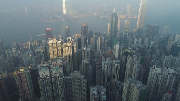 Hong Kong Skyline and Victoria Harbour. Aerial View. Drone Is Flying Forward alt