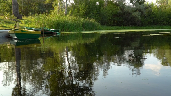 Old Boats on River