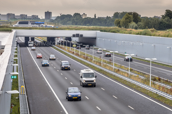 Afternoon traffic on motorway in Randstad - Stock Photo - Images