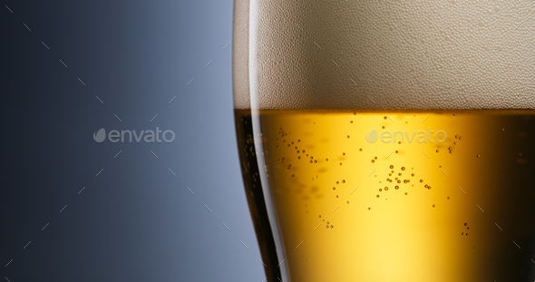 Alcoholism And Addiction Issues Lager Beer Pouring Into Glass - Stock Photo - Images
