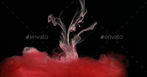 Red Ink Paint in Water Creating Liquid Artistic Shapes - Stock Photo - Images