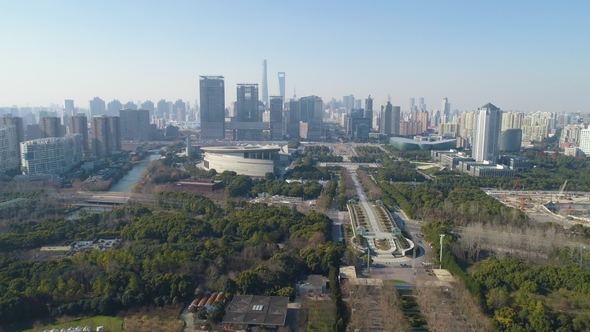 Green Park and Shanghai Downtown at Sunny Day. China. Aerial View alt